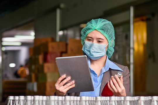 Asian women business wear face mask protect coronavirus covid 19 Asian women business wear face mask protect coronavirus covid 19 and working in beverage product factory